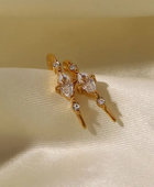 Jani Put on Diamond Earrings
