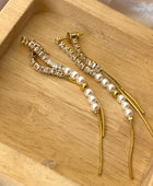 Tasha Long Pearl Statement Earrings
