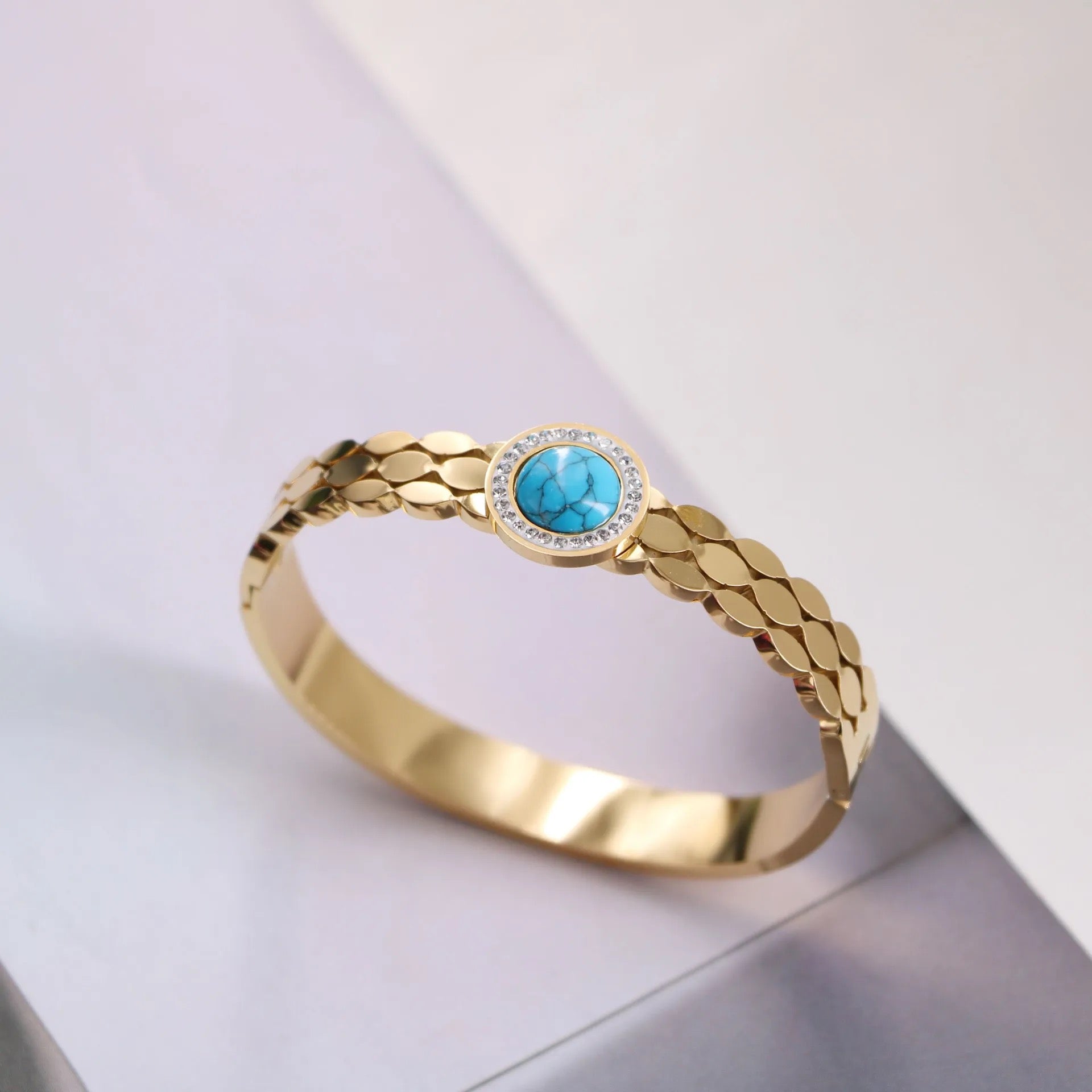 Saturn Blue Stone Gold Cuff