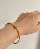 Knot Gold and Rose Gold Cuffs