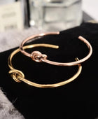 Knot Gold and Rose Gold Cuffs