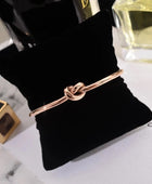 Knot Gold and Rose Gold Cuffs