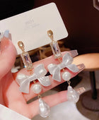 Korean Bow Hanging Pearl Earrings