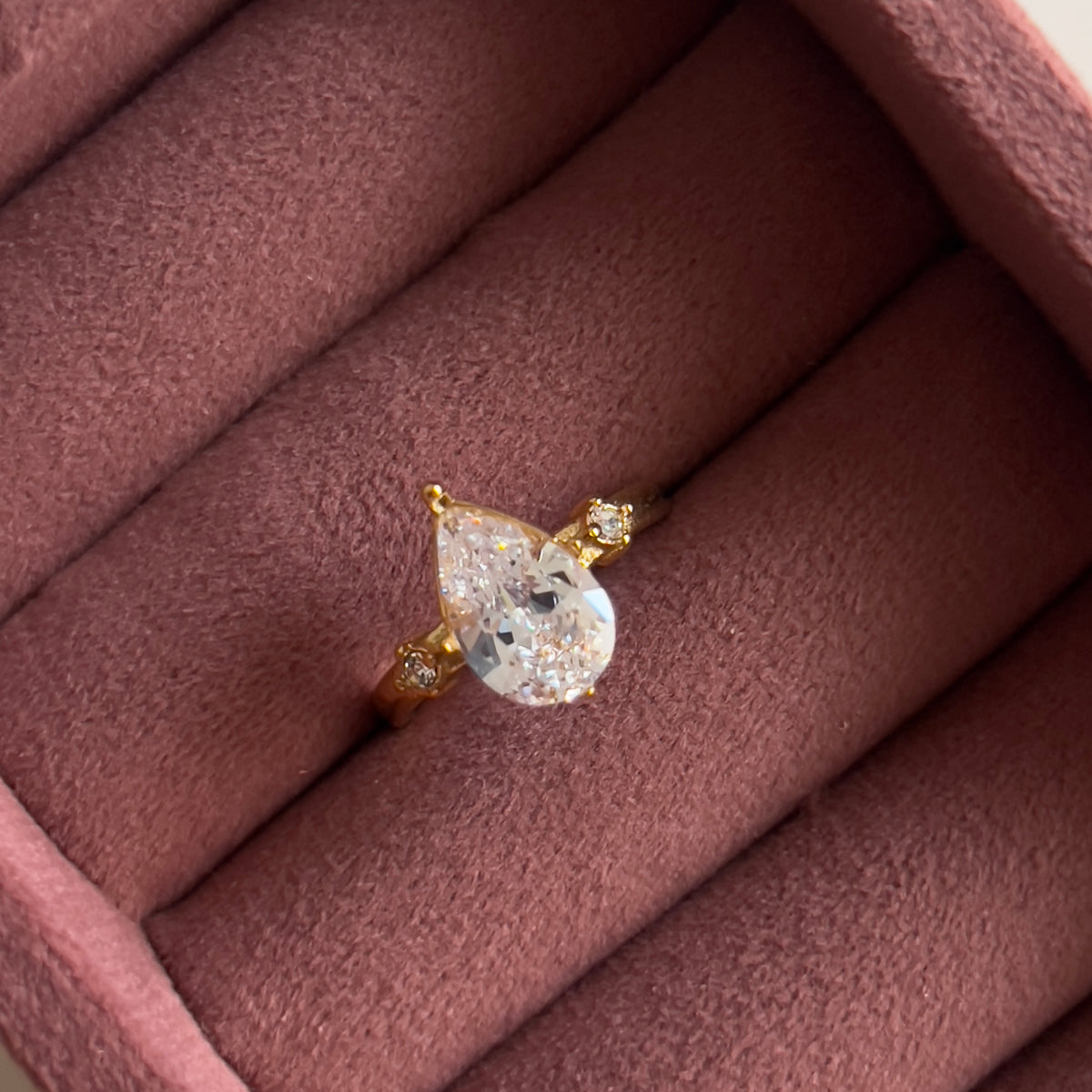 Remis Pear Solitaire Rings