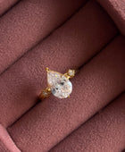 Remis Pear Solitaire Rings