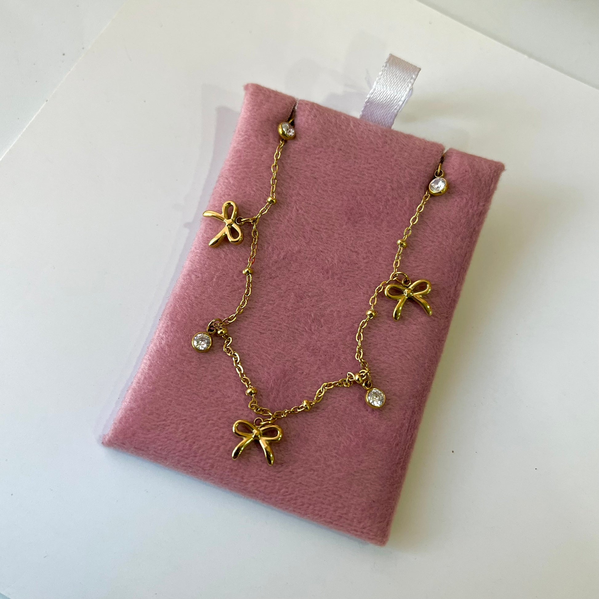 Qvali Bow Charm Necklace