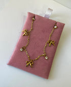 Qvali Bow Charm Necklace