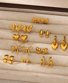 Qira Small Bow Earrings
