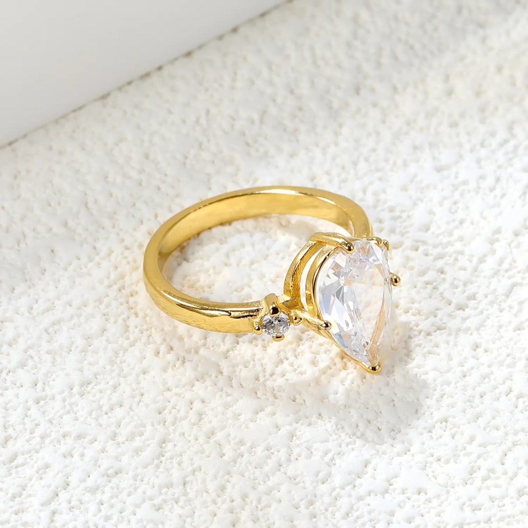 Remis Pear Solitaire Rings