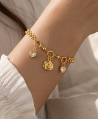 A Rosey Hanging Gold Bracelet