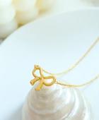 Dua Bow Necklace