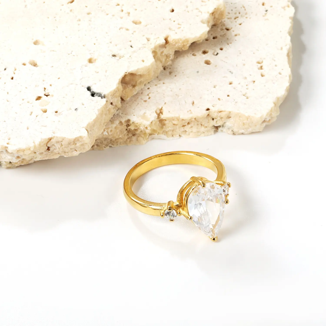 Remis Pear Solitaire Rings