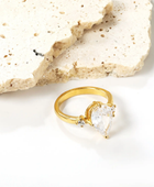 Remis Pear Solitaire Rings