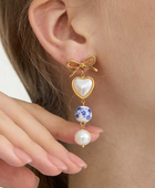 Shelza Long Bow Pearl Earrings