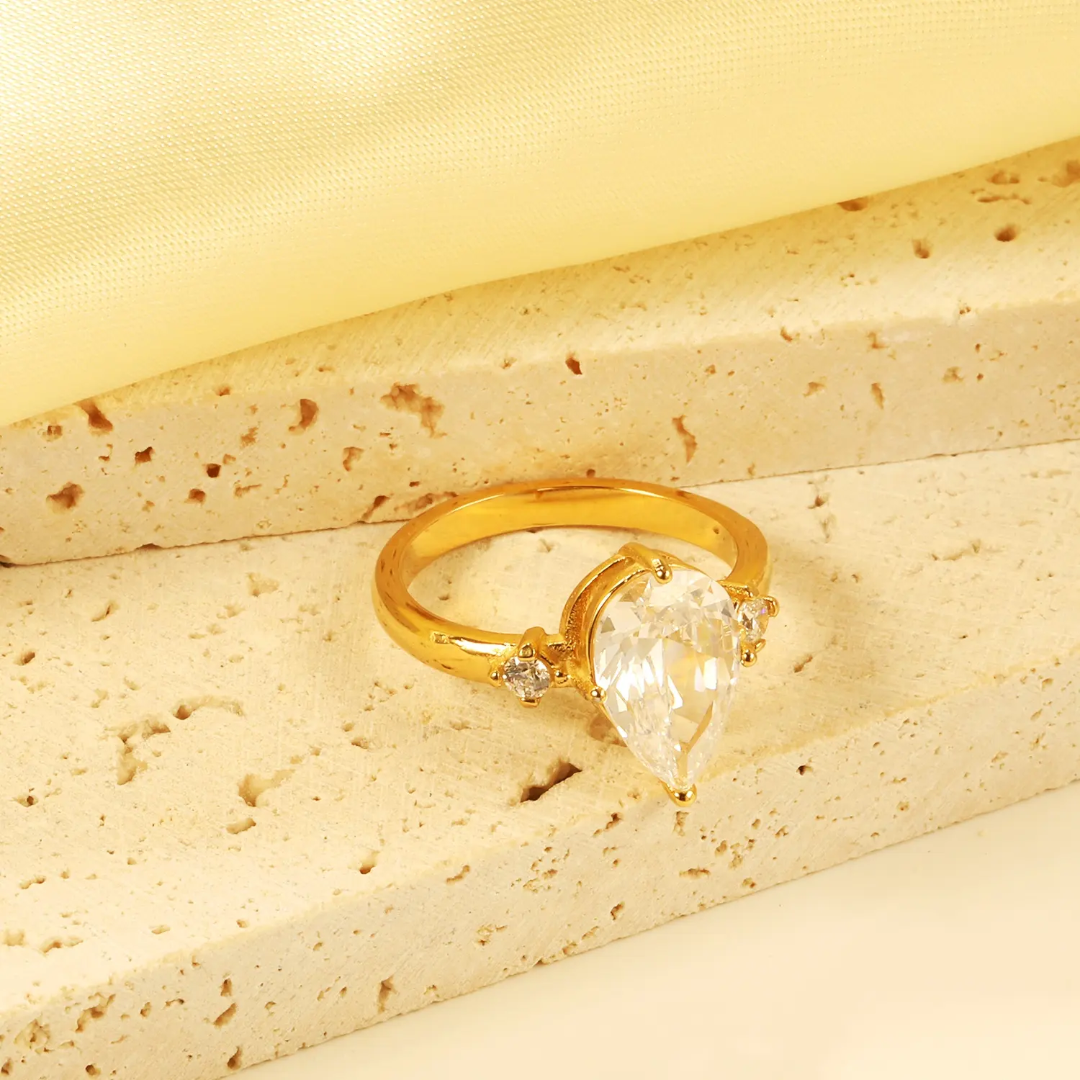 Remis Pear Solitaire Rings