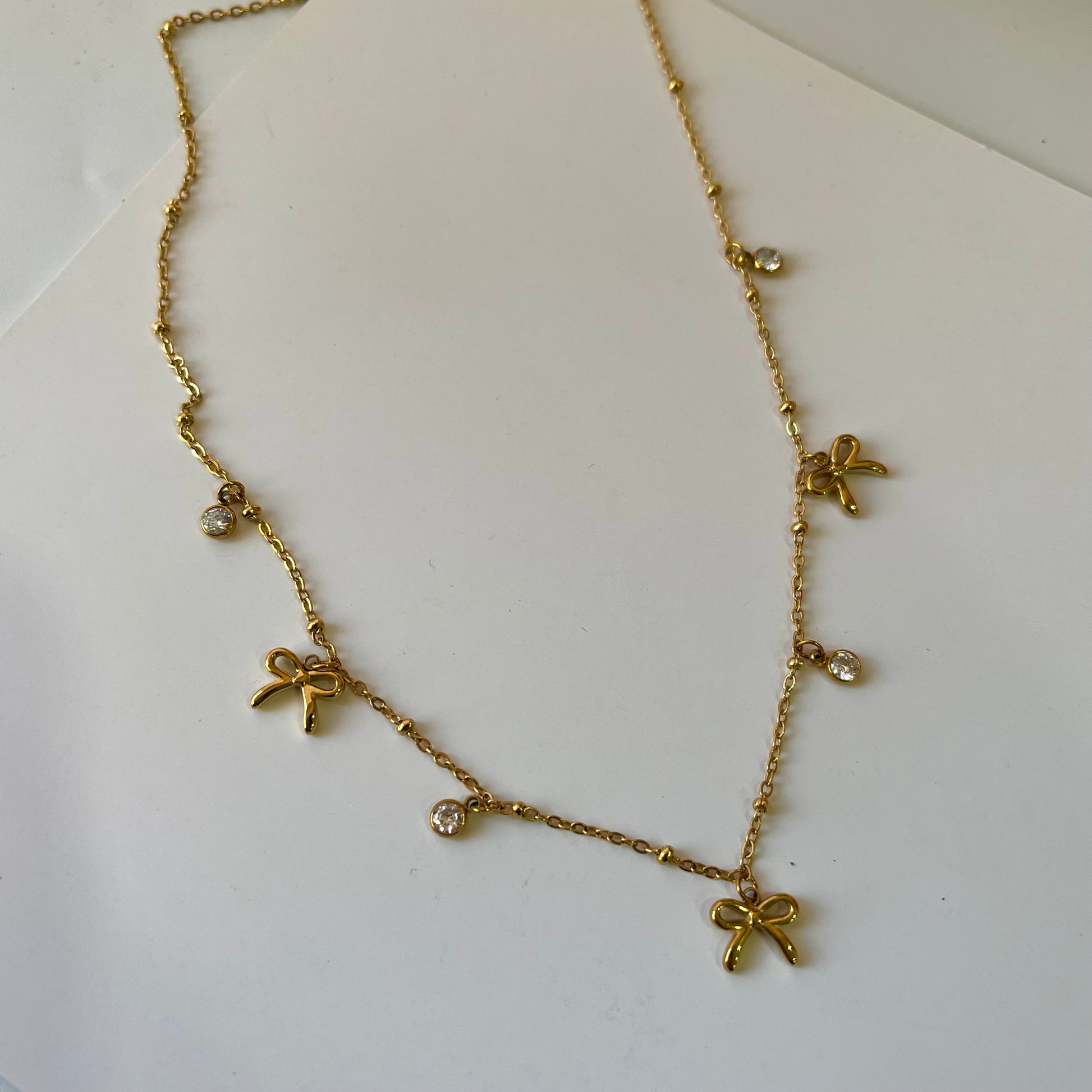 Qvali Bow Charm Necklace
