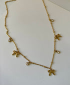 Qvali Bow Charm Necklace
