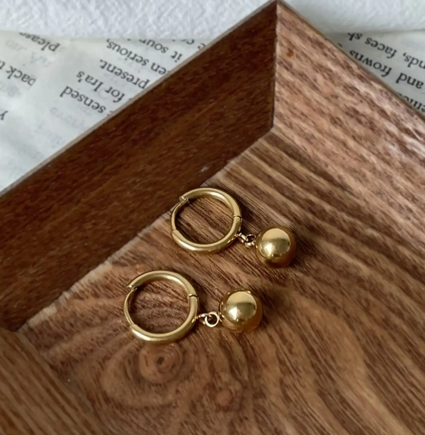 Ruru Ball Golden Earrings