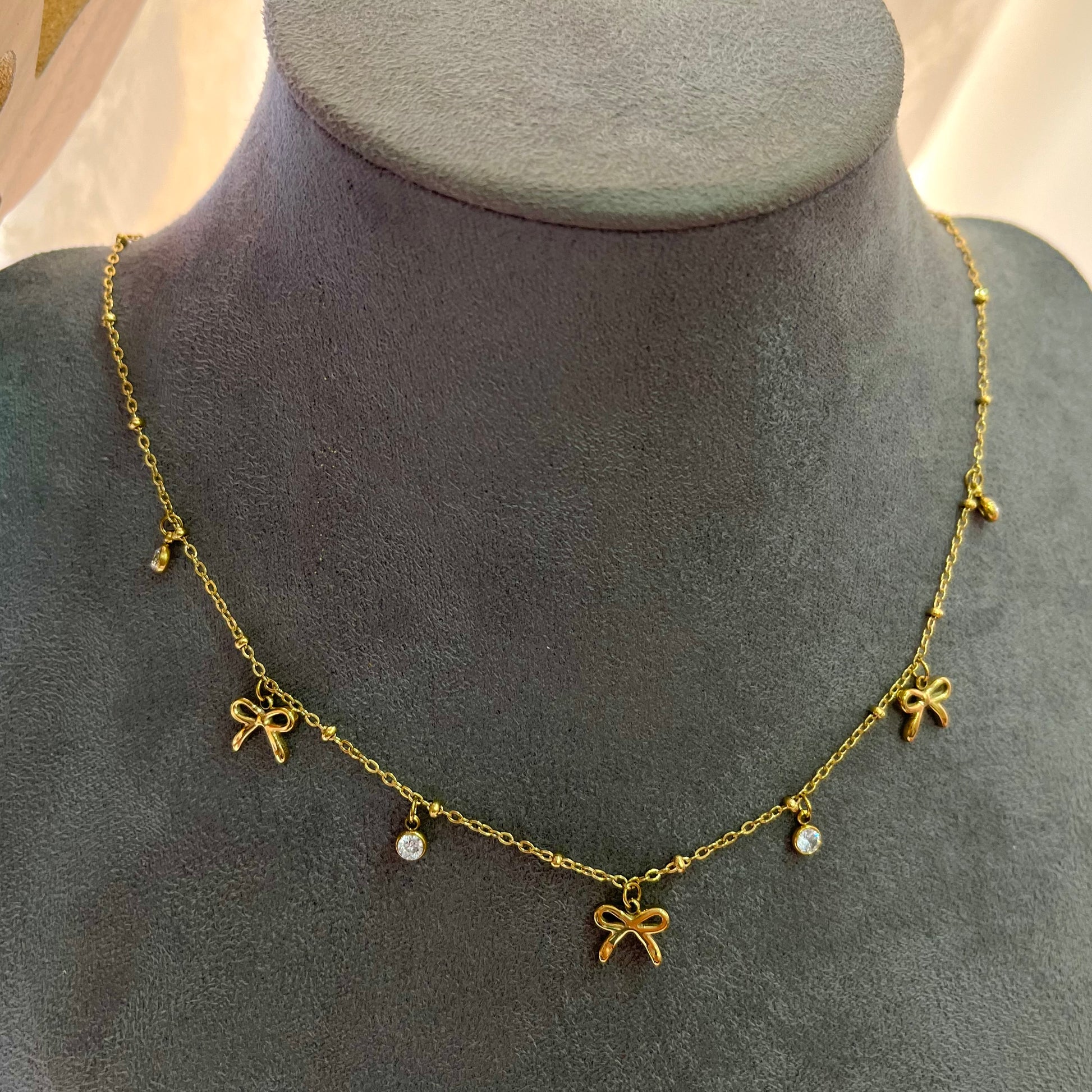 Qvali Bow Charm Necklace
