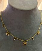 Qvali Bow Charm Necklace